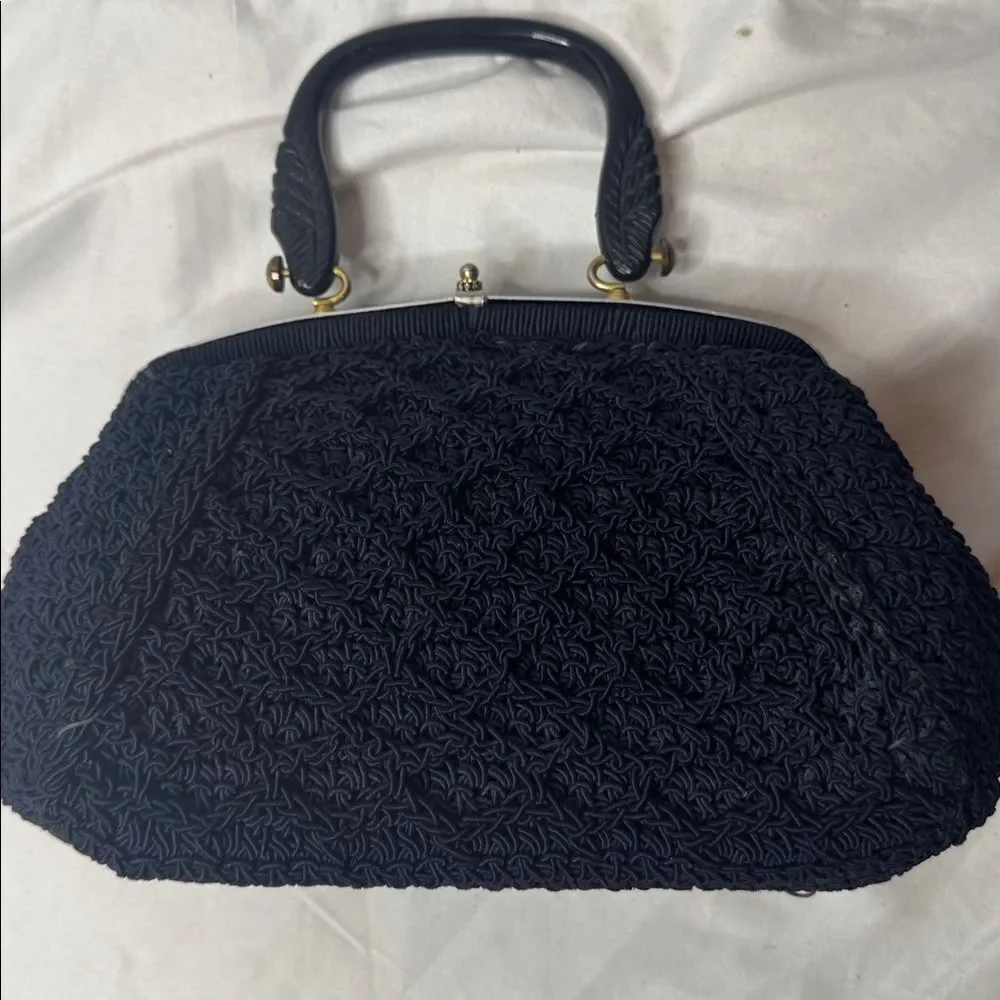 Vintage 60’s Black Knit Dumpling Bag With Silver And Gold Fixtures.